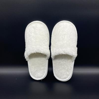 China OEM logo hotel spa travel slippers waterproof coral velor waterproof disposable indoor environmental protection men and women universal closed toe for sale