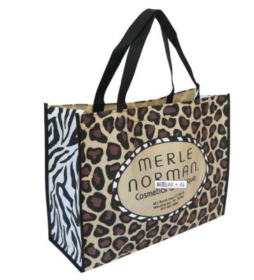 China Promotional Reusable Custom Logo Supermarkets Mall Non Woven Tote Leopard Printing Handled Shopping Bags Wholesale for sale