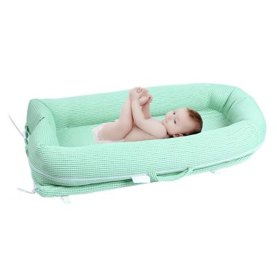 China Eco-friendly Baby Nest Materials Soft Breathable Newborn Sofa Perfect For Sleeping Portable Crib For Travel for sale