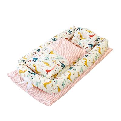 China Eco-friendly Materials Folding To Disassemble Portable Wash Hutch In Bionic Bed With Infant Pillow Baby Travel Crib Bed Nest for sale