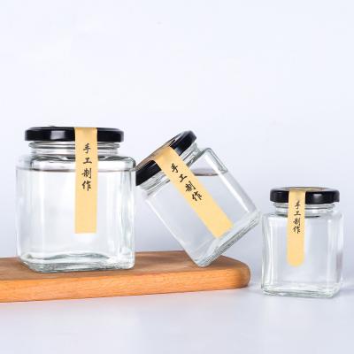 China Empty Square Amber Glass Jars Honey Jar Glass Frascos de vidrio Glass Food Square Jar for Honey for sale