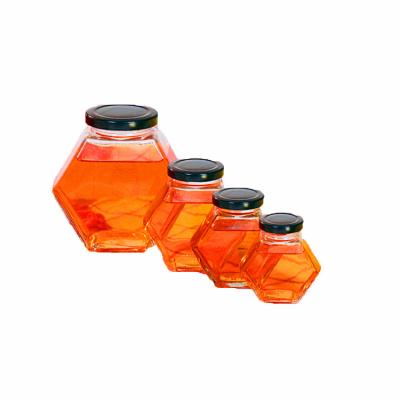 China CLASSIC high quality 380ml hexagon glass jar customer made honey glass jar for sale