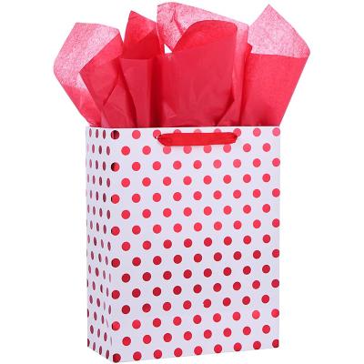 China Recycled materials wholesale new fashion polka dot colorful design luxurious shopping paper bag for gift for sale