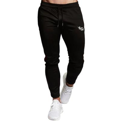 China Stretch Fitness Muscle Building Muscle Breathable Pure Cotton Breathable Quick Dry Pants Slim Casual Running Sports Pants for sale