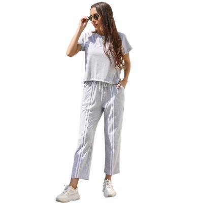 China Breathable Women Fashion Striped Tracksuit Round Neck T-shirt Top And Pants Two Piece Set for sale