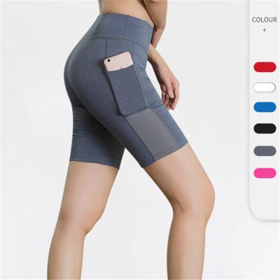 China Pockets Breathable Fitness Side Shorts Yoga Women Running Stretch Tights Sweat Wicking Five Point Pants for sale