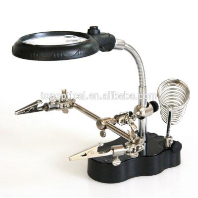 China Plastic helping hand with led magnifying light luminous desk lamp Te koop