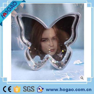 China Europe Butterfly Shape Water Globe Artificial Acrylic Plastic Plastic Snow Globe for sale