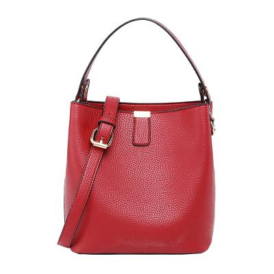 China Fashion Women's Large Capacity Oblique Straddle Handbags Fashion Shopping Handheld Wrap Leather Custom Design Famous Brand Bags for sale