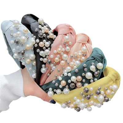 China New Fashion Hair Decoration Baroque Knotted Pearl Headband Hair Accessories Promotion For Women for sale