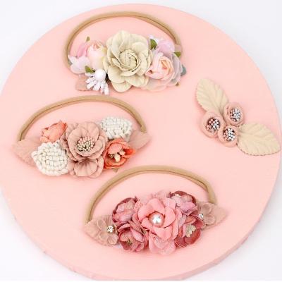 China Hair Decoration Safety And Cozy Headband Baby Flower Babies Head Elastic Cushion Decorative Headband Environmental Material for sale