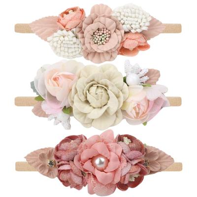 China Hair Decoration Fashion Design Newborn Baby Headbands Lovely Knitted Flower Handmade Headband for sale