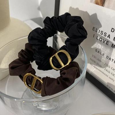 China Hair Accessories Fashion Scrunchy Hair Ties Silk Rope Accessories Elastic Hair Band CD Letter Elastic French Rope Hair Rope for sale