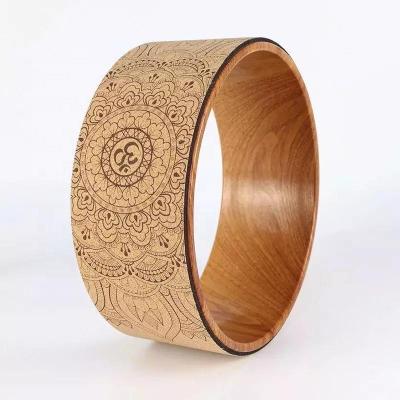 China Fitness & Yoga Exercises Fitness Yoga Wheel Band Cork Wood Yoga Wheel High Quality Manufacturers for sale