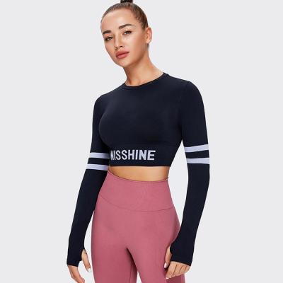 China Ladies Fashion Navel High Top Women X-Seat Seamless Elastic Breathable Sports Long Sleeve Fitness Yoga Shirt for sale