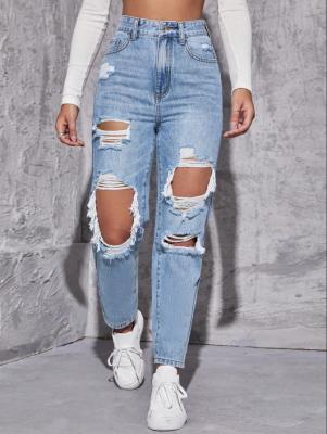 China Medium blue ripped denim pants for sale