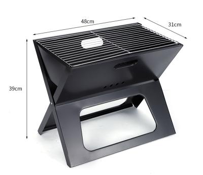 China Easily Assembled Hot Selling Large Outdoor Notebook Folding Grills Outside Picnic Foldable BBQ Grill Portable Charcoal BBQ Grill for sale