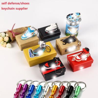 China The hot selling daily life volume of 3d mini shoes keychain box sneaker key chain cute metal window breaker self-defense key chain for sale