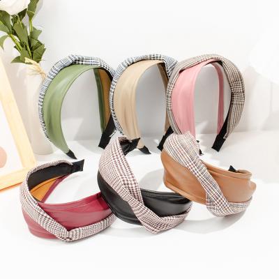 China Fashion Press Knotted Headband Wild Wide Side Headband Friendly Color Contrast Leather Material Layer for sale