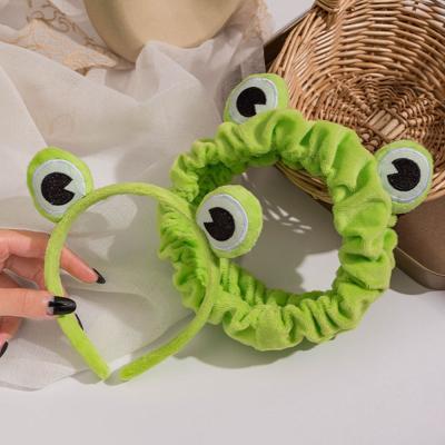 China Fashionable Funny Wide Brim Elastic Hairbands Hairband Cute Makeup Frog Women Girls Headdress for sale