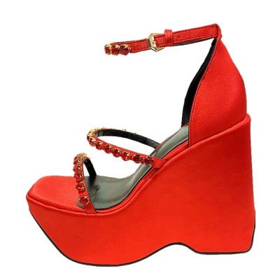 China 2022 New Designer Trend Fashion Slope Faux Stone High Heel Thick Bottom Large Size Women's Sandals Custom Made High Heels for sale