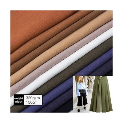 China Polyester Shrink-Resistant Elastic Woven Fabric For Fashion 100%T High End Fabric For Suit And Pants for sale