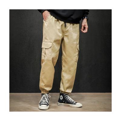 China Multiple Pockets Multi-pocket Cargo Pants Mens Loose Waist Casual Pants Custom for sale