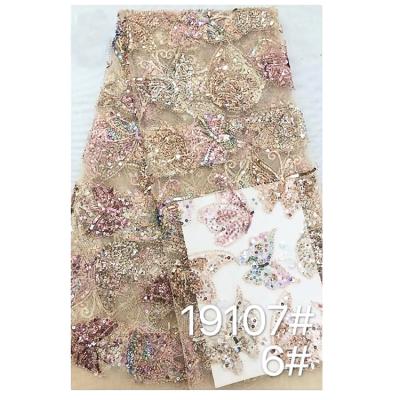 China Good quality viable nigerian french sequins lace fabrics 2021 bridal butterfly beaded lace fabric for dresses for sale