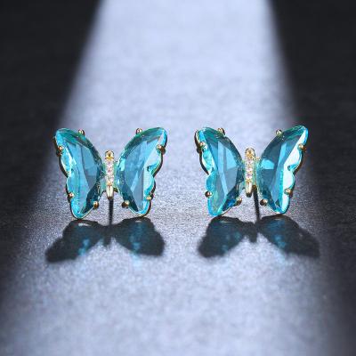 China Trendy Retro Flower Female Sweet Blue Luminous Crystal Butterfly Fashion Single Earrings for sale