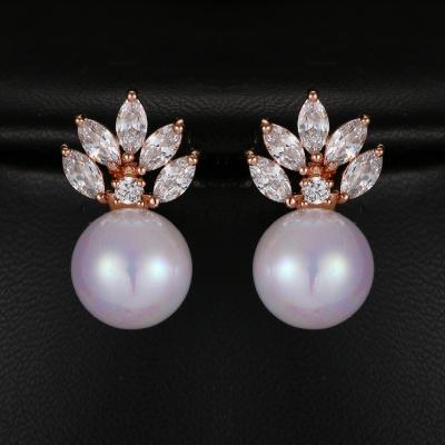 China Fashion Factory Direct Sales Trendy Elegant Leaf Pearl Earring Inlaid Horse Eye Zircon Stud Earrings for sale