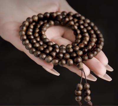 China Yazhuang Qinan Agarwood Bead Bracelet Nine Point Submerged Water Grade Bracelets Sandalwood Buddha Beads For Men for sale