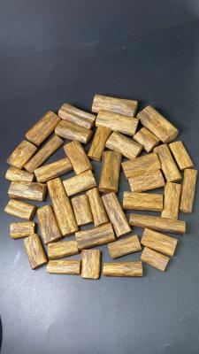 China Marca Qinansu OUD natural Agarwood madera especias de madera Condimento Hainan Chenxiang en venta