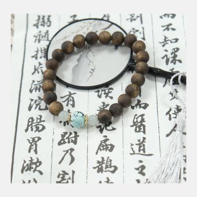 China Turquoise Jade Agarwood Bracelet Dark Brown Tenth Grade for sale