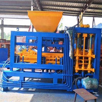 China Building Material Shops Building Material Making Machinery QT4-15 Concrete Hollow Block Making Machine Price List for sale