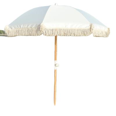 China Minimalist Wholesale Wind Resistant Outdoor Canopy, Tassel Beach Restaurant Umbrella Table Top Umbrella Parasol for sale