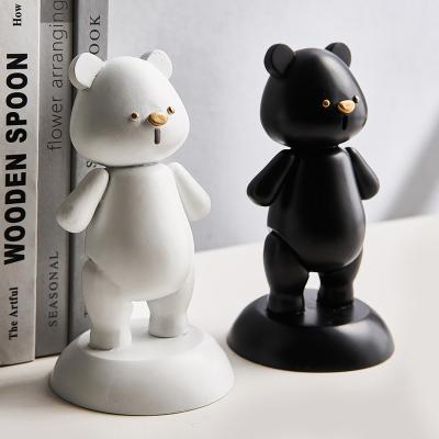 China Nordic Simple Modern Decoration Gifts Home Bear Ornaments Animal Model Cute Black And White Resin Bear Living Room Decoration for sale