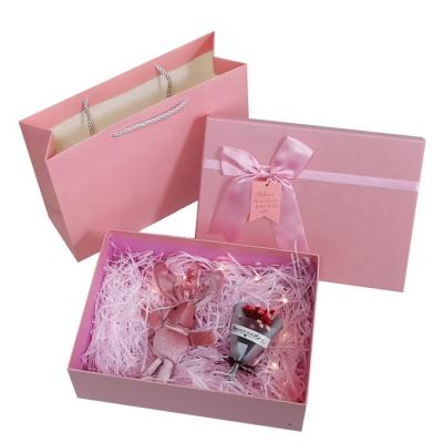 China Recyclable Simple Pink Bow Gift Box With Top And Bottom Lid Cardboard Box Birthday Gift Envelope Rigid Lipstick Box for sale