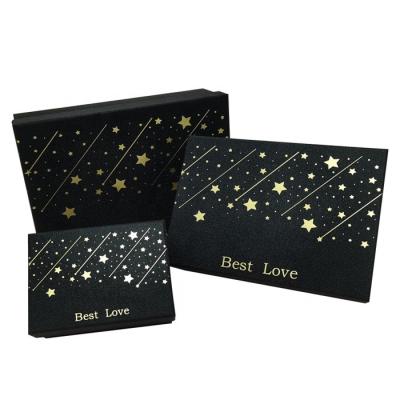 China Gold White Onion Gift Box Gold Star Birthday Gift Envelope Recyclable Black Frosted Christmas Gift Box for sale