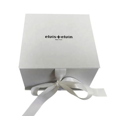 China Recyclable Custom High End Ribbon Gift Box Cosmetic Packaging Box With Magnetic Button Flip Box for sale