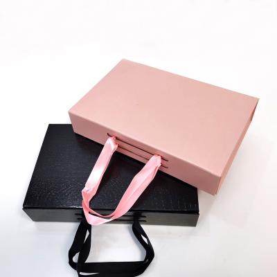 China Recycled Materials Custom Textured Paper Gift Box With Lid Buckle Magnetic Folding Packaging Box With Handle Design Wedding Gift Box for sale