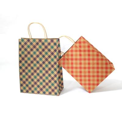 China Recyclable Wholesale Custom Paper Packaging Bags Colored Logo Brown Paper Packaging Shopping Bags for sale