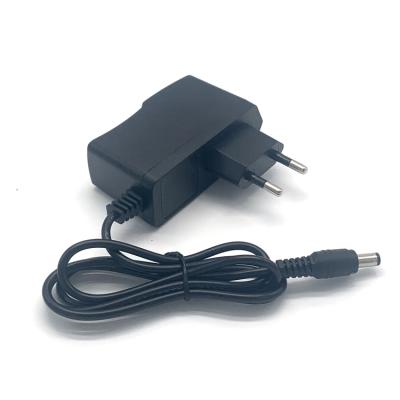 China Power change adapter input 110V to DC 220V output 5V 2amp power US/EU/UK plug for surveillance camer/router/TV box 82-5V2A for sale