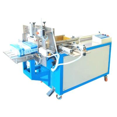 China Adult Half Diaper Semi Automatic Manual Adult Diaper Packing Machine Price for sale