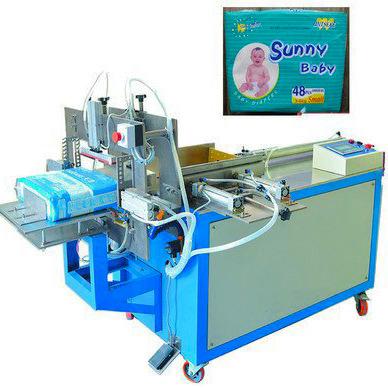 China Garment Shops Baby Diaper Packing Machine New Design Good Quality Easy To Use Semi Automatic Baby Diaper Packing Machine With Low Price for sale