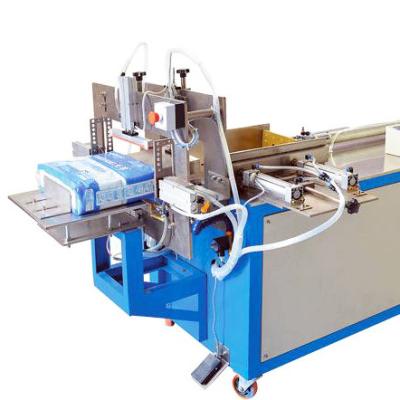 China Garment Shops High Speed ​​Cheap Price Manual Adult Diaper Packing Machines for sale