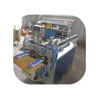 China Factory Semi Automatic Double Head Sanitary Napkin Pad Packing Machine Price for sale