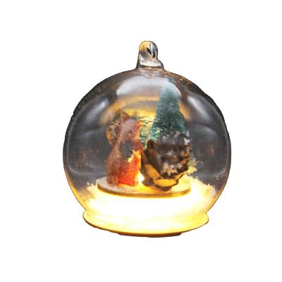 China Europe Christmas Ball Pendant Light Glass Ball Transparent Christmas Tree Ornaments with LED Lights Santa Scene Inside Ornament for sale