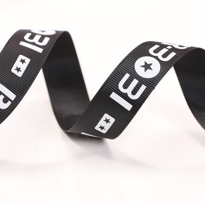 China Eco-friendly 2 Cm Black Grosgrain Ribbon With Big White Character Sill Printing Logo Decoration Ribbon for sale