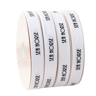 China 2.5cm-1 Inch Floral Elegant Color Pure White Ribbon With Black Sample Silk Simple Printing Logo Ribbon for sale