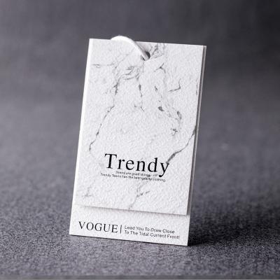 China Wholesale Recyled Fantastic Marble Texture Embossed Rough Outdoor Style Garment Clothes Using Hang Tag for sale